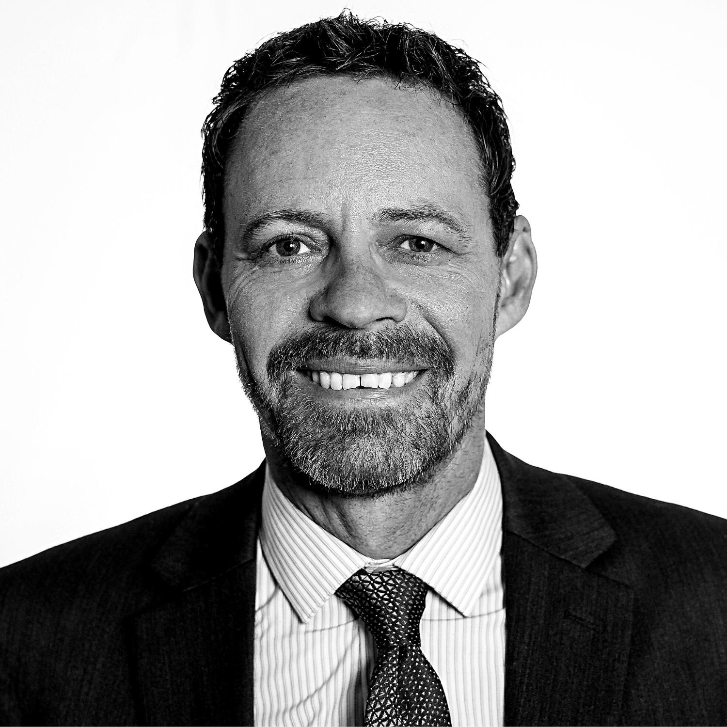 ceo headshot photography in corporate studio black and white ceo headshot example
