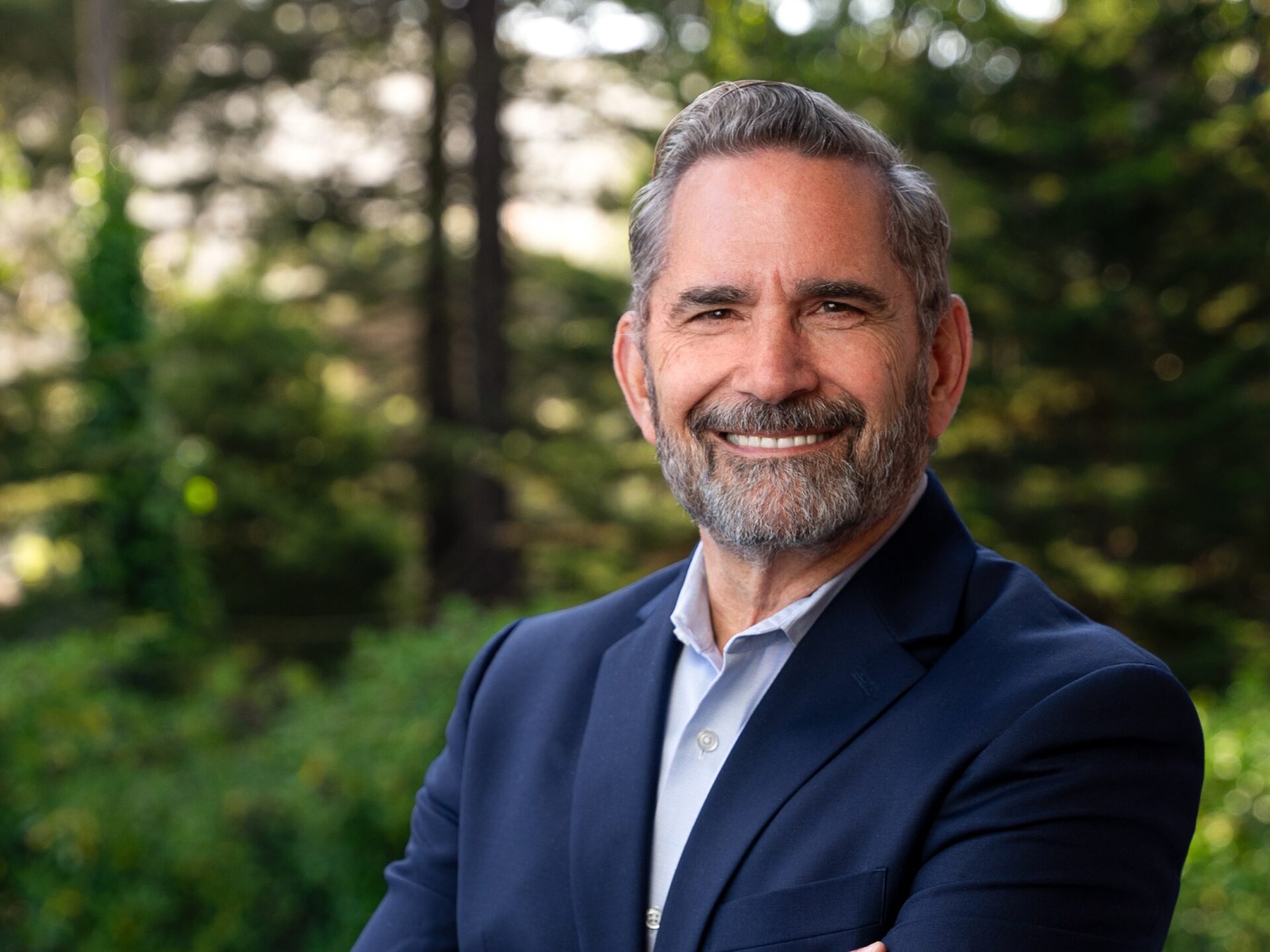 executive headshot of hotel owner in forrest