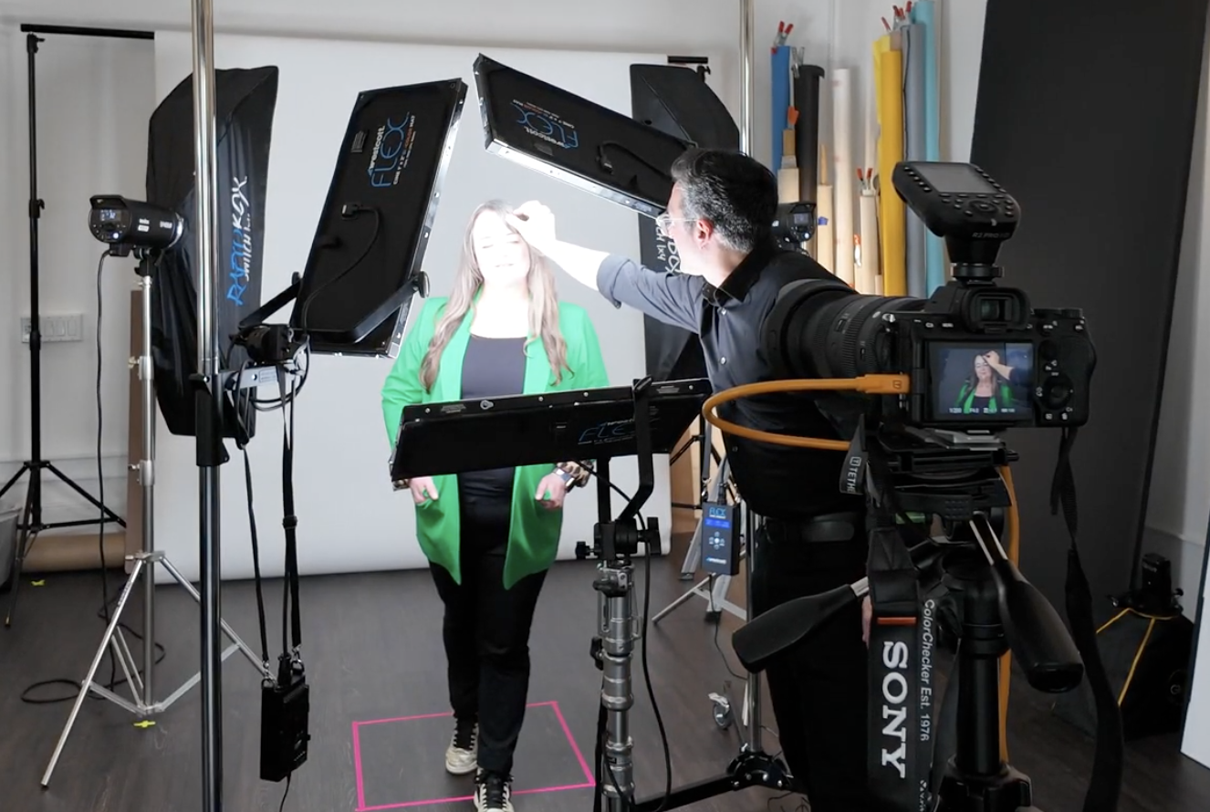 bts photographer adjusting client hair